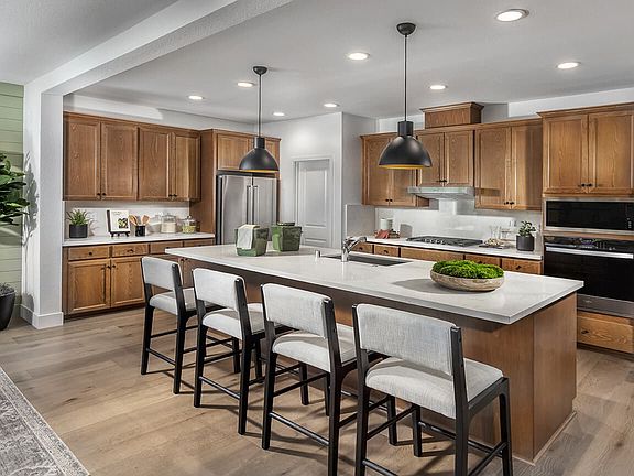 This sophisticated kitchen is the perfect blend of style and functionality. Featuring sleek countert