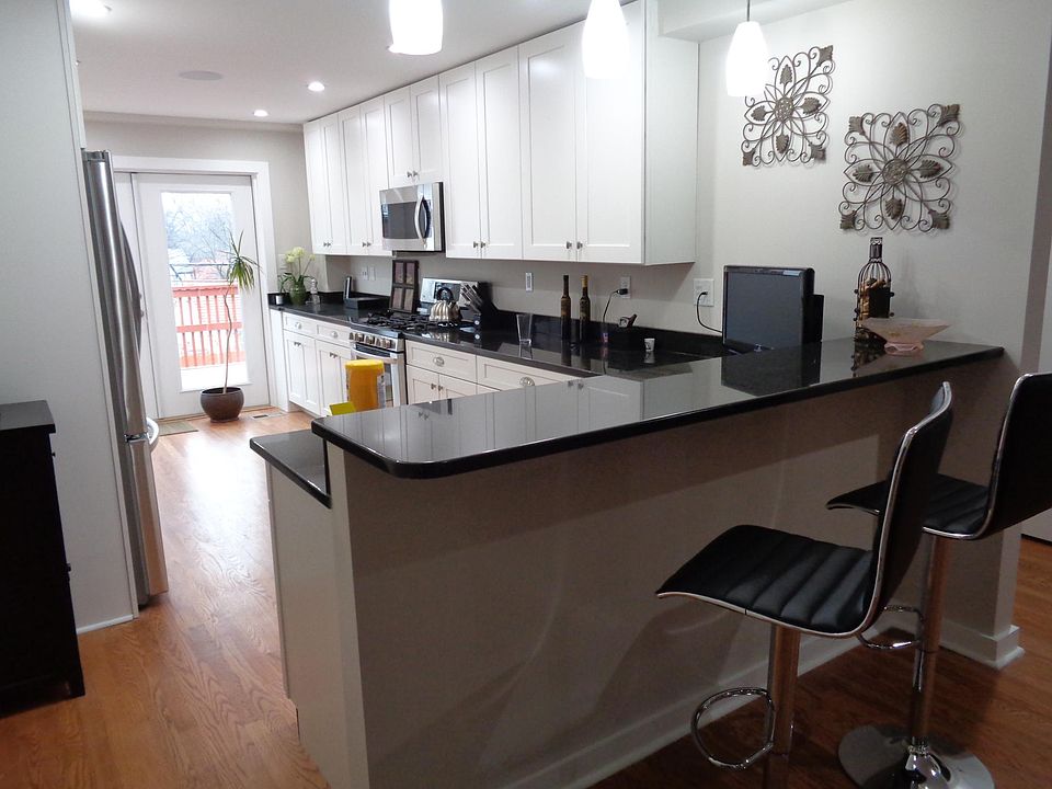 Kitchen View to French Door & Deck, gas stove, microwave