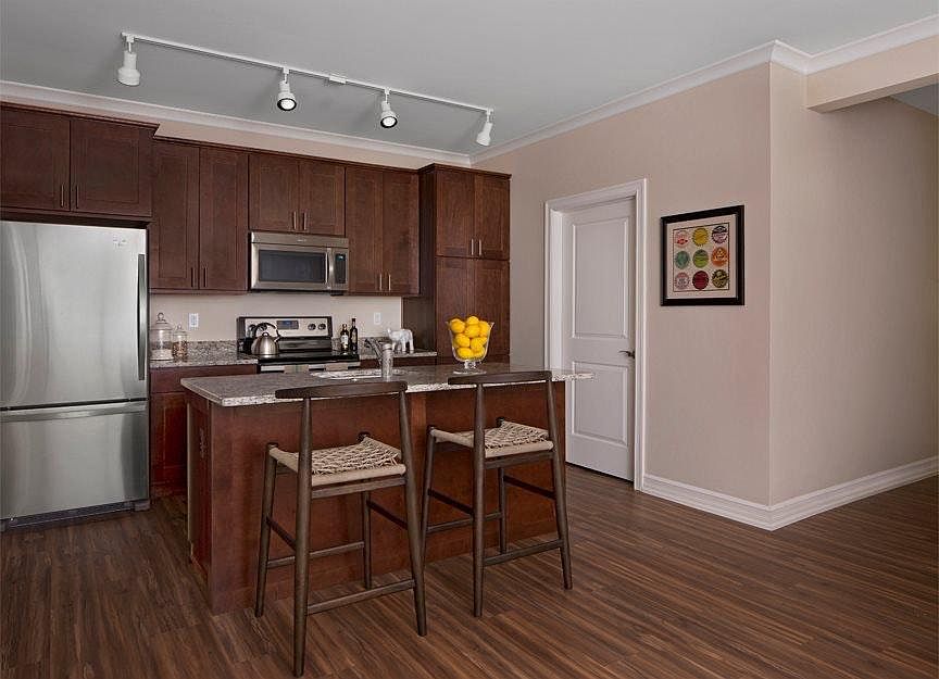 Modern kitchen with granite countertops and stainless steel