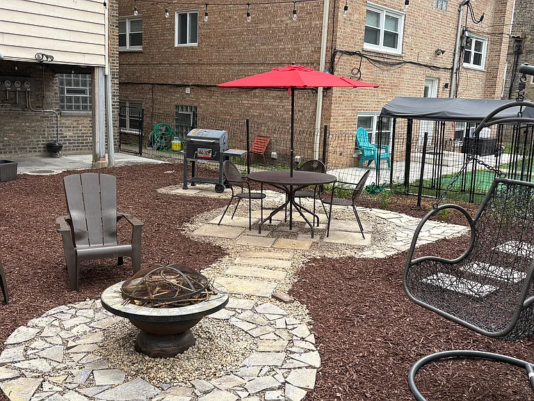 Shared backyard w/ fire pit, grill, and patio furniture