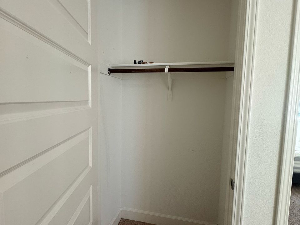 Closet inside next to garage to hang clothes on first floor