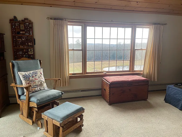 Living room overlooking the pond and Mount Monadnock