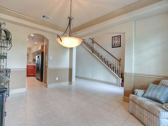 Spacious dining room currently used as a sitting room. Need a study? With the simple addition of fre