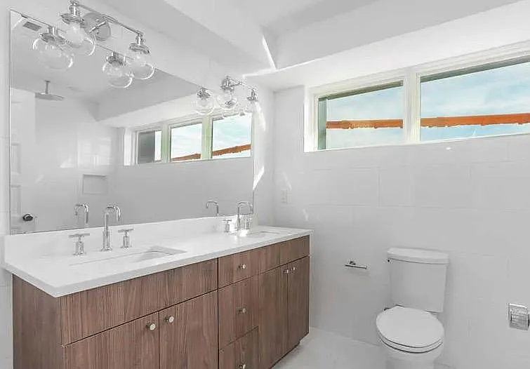 Large Master bathroom with 2 sinks. Glass door shower is on the other side.