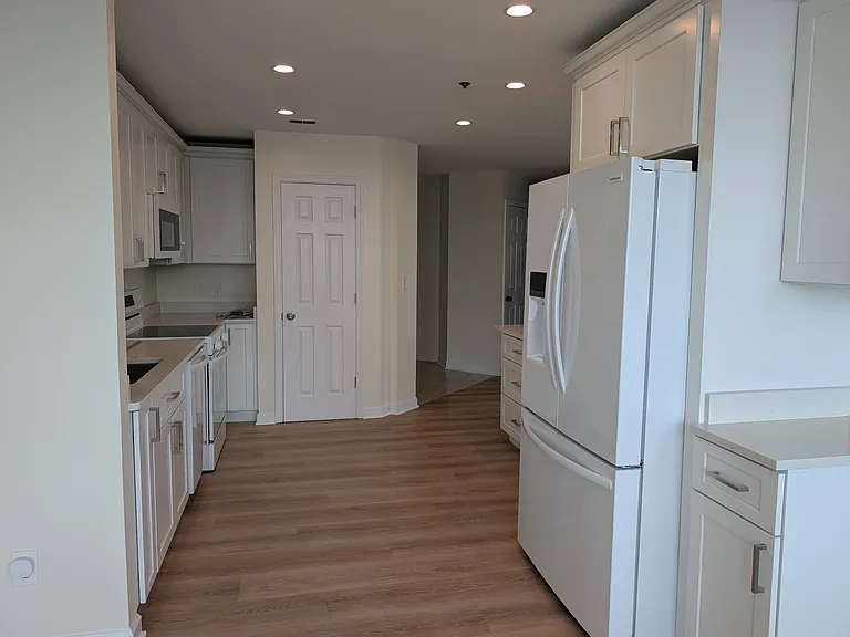 View of kitchen from dining room