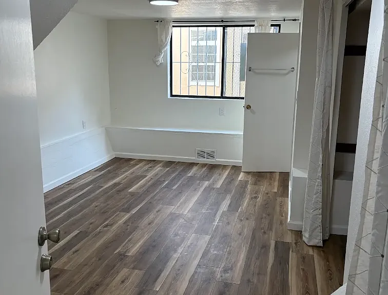 Remodeled ground level bedroom with walk-in bathroom