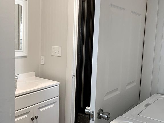 Bath with washer/dryer