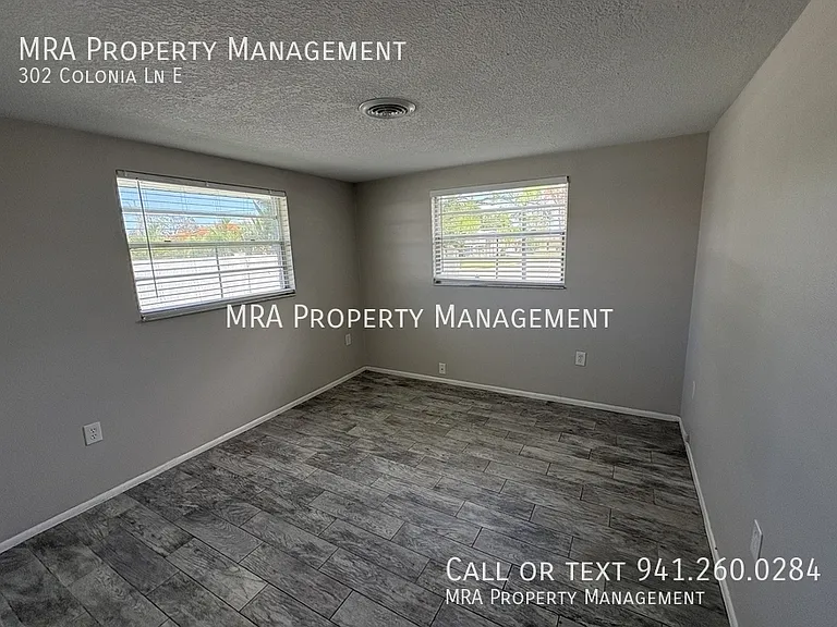 302 Colonia Ln E — Photo 8