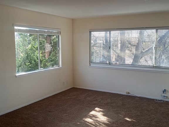 Smaller window facing west, larger facing north.