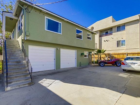 Top floor is unit, 1 garage below