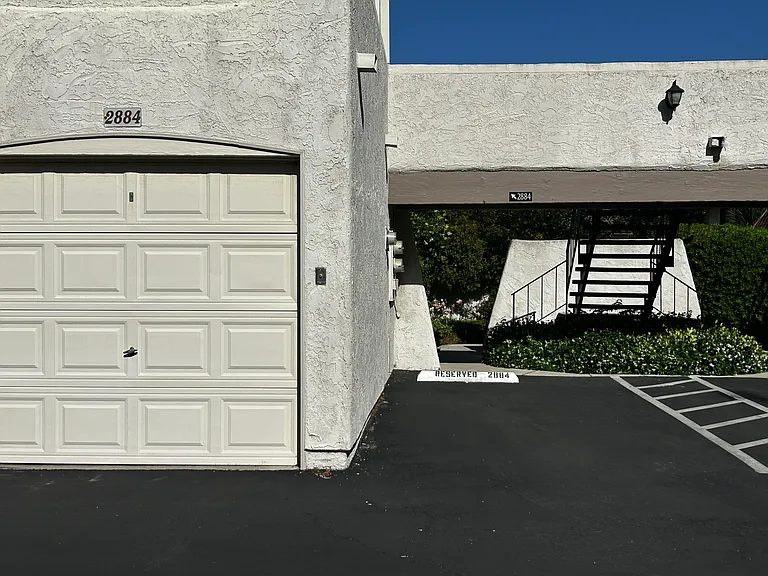 One car garage and one assigned parking space