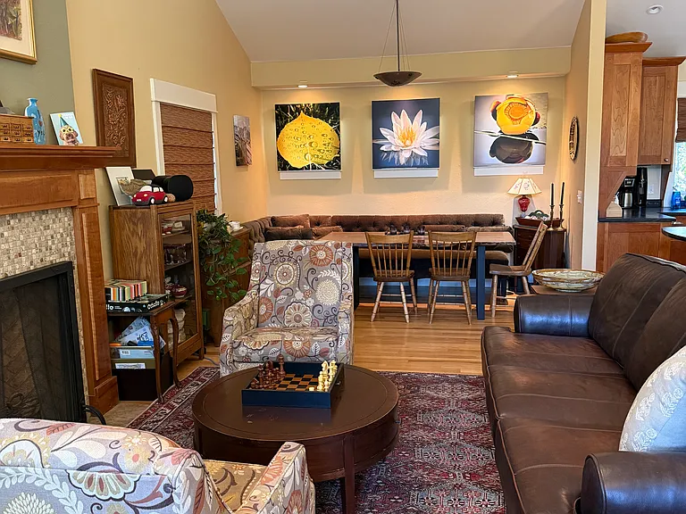 View of partial living room to dining area.