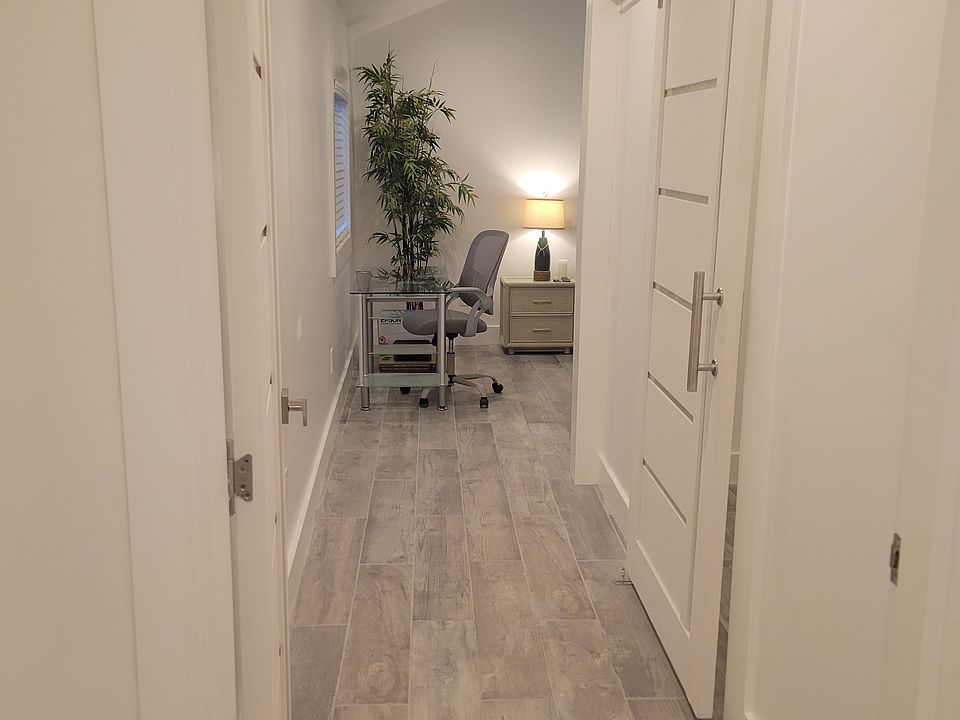 View of the spacious hallway leading to the master bedroom