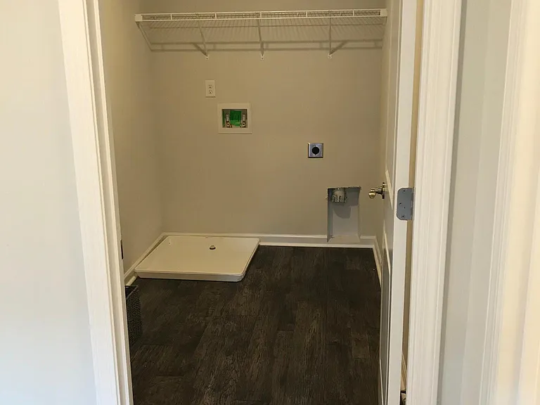laundry area upstairs with all bedrooms