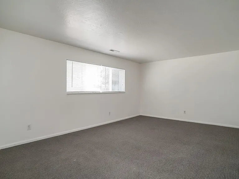 Spacious Living Room with Large Window.