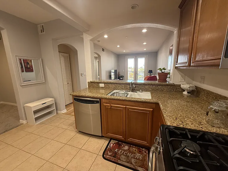 Open kitchen with situated with views to the rest of the condo.