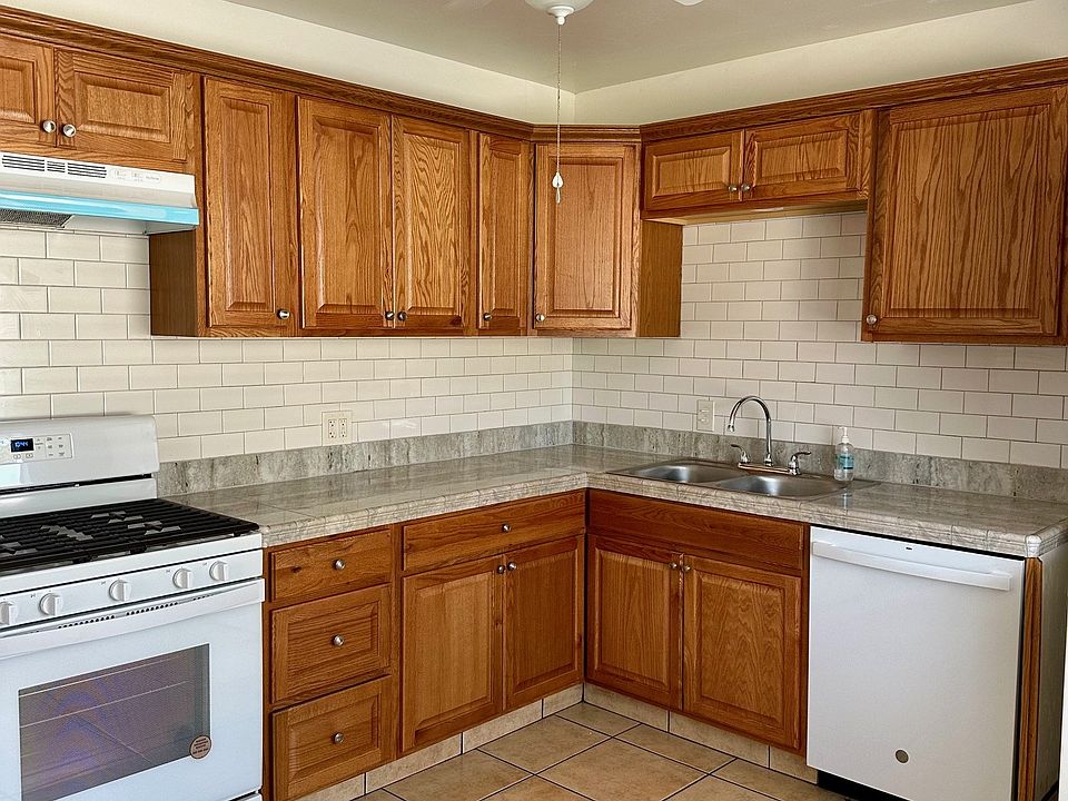 new kitchen, new stove, new ceiling fan, dishwasher and oven fan