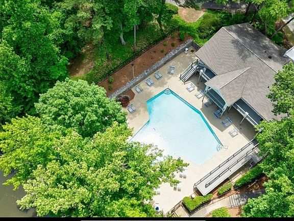 Aerial view of pool and pond