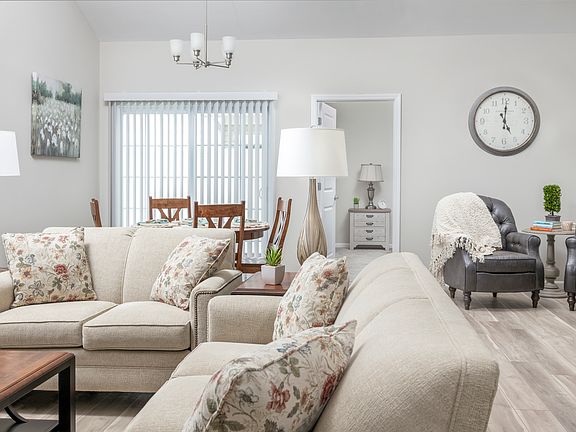 Open plan living, dining and kitchen. Vaulted ceiling, big windows and lots of natural light.