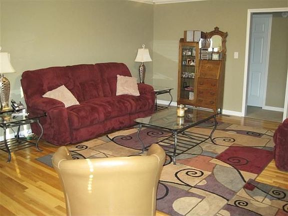 Living room, kitchen, dining room and foyer have hardwood floors