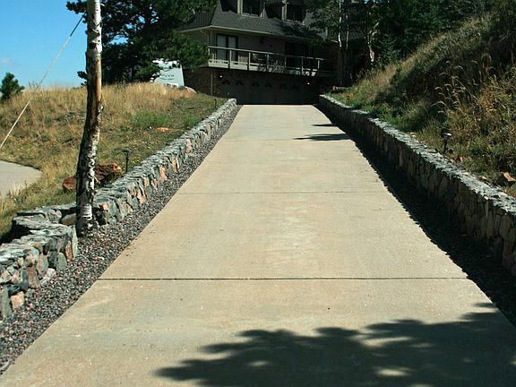Rock Walled Drive Way