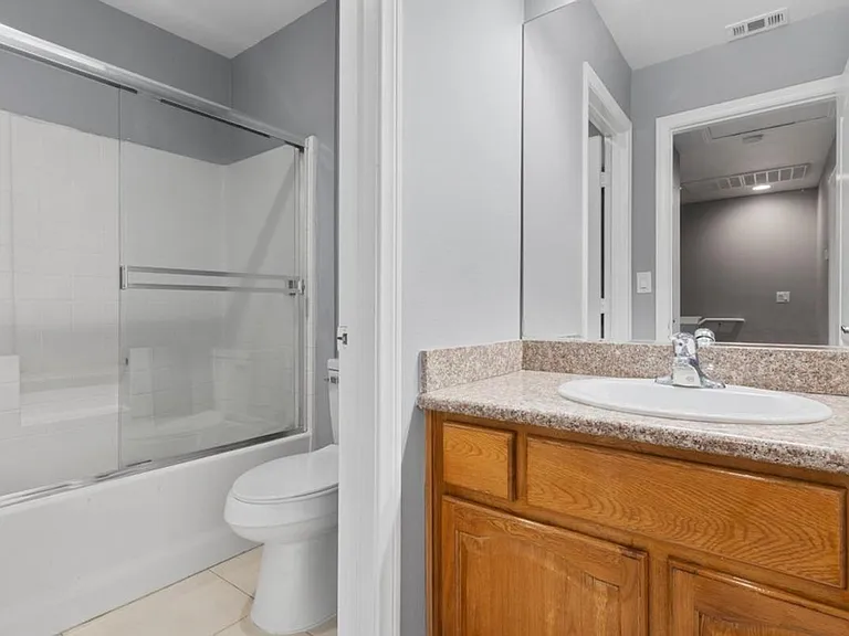 Large Renovated 3-Bed/2.5-Bath Townhomes at a Great Price with Covered Parking Included — Photo 19