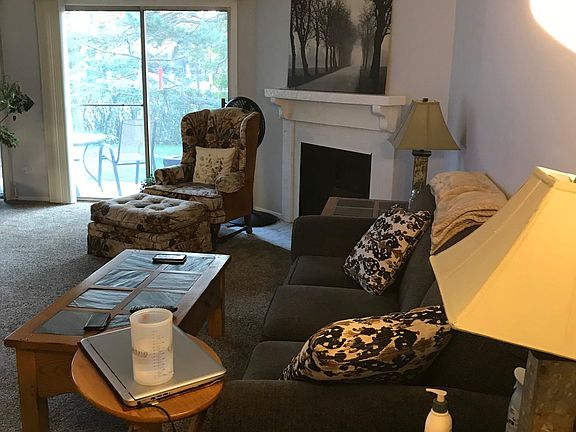 Family Room with sliding door to patio. Note: Fireplace not functional