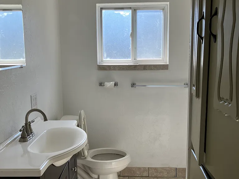 the bathroom also has a large closet, the shower is 37" x 54"