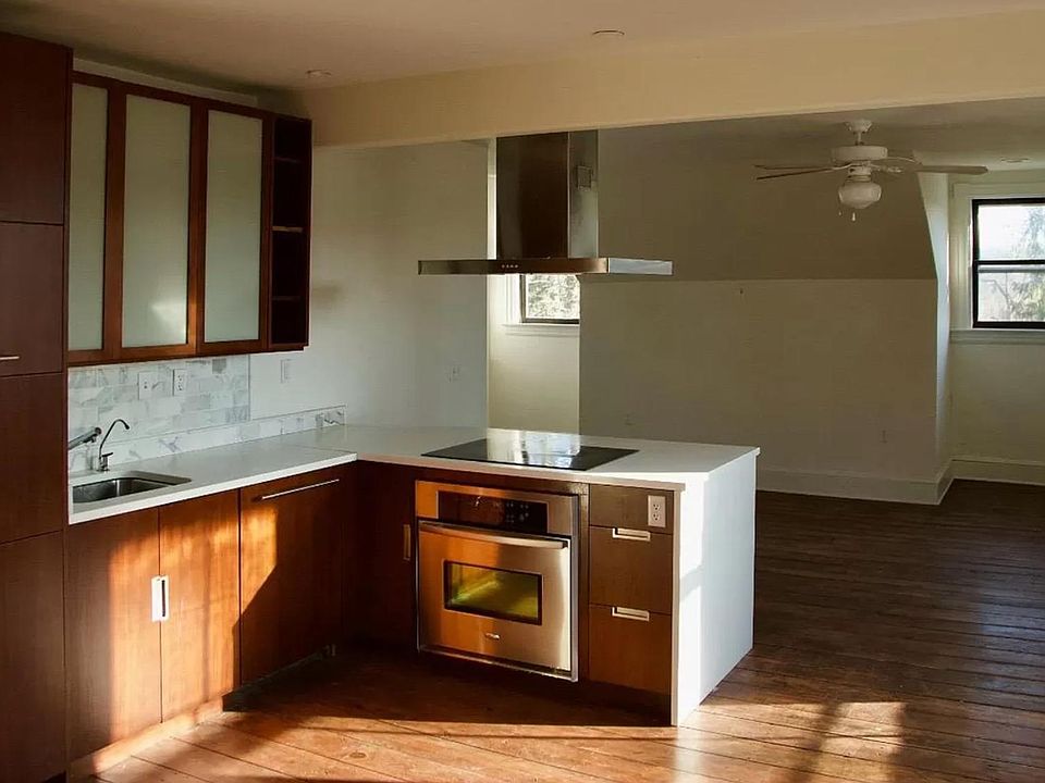 Open living/dining and kitchen.