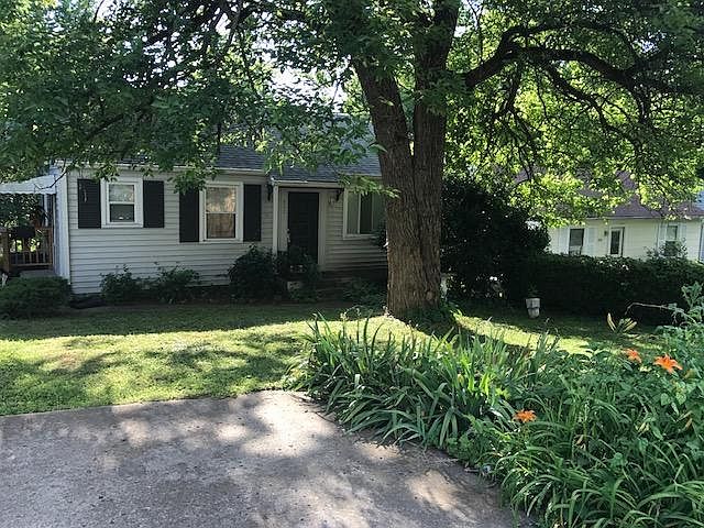 Front of house with lovely garden