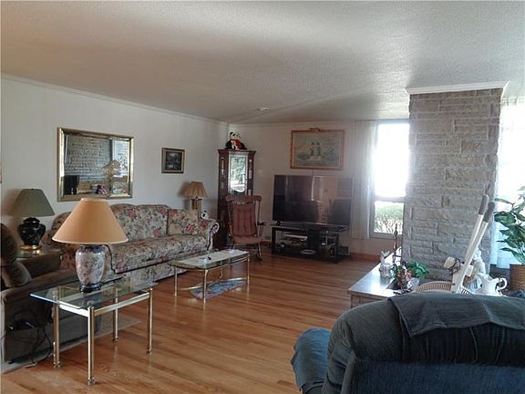 Notice the beautiful hardwood flooring which has been redone.