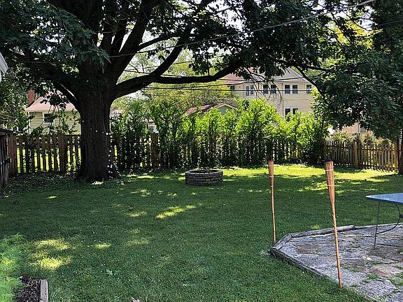 Fenced yard with firepit