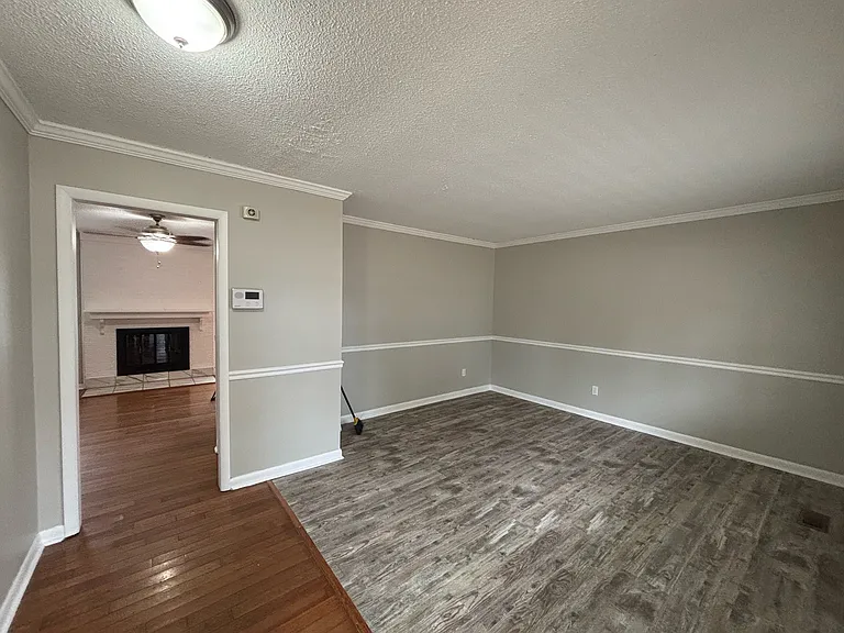 Formal living room view #1