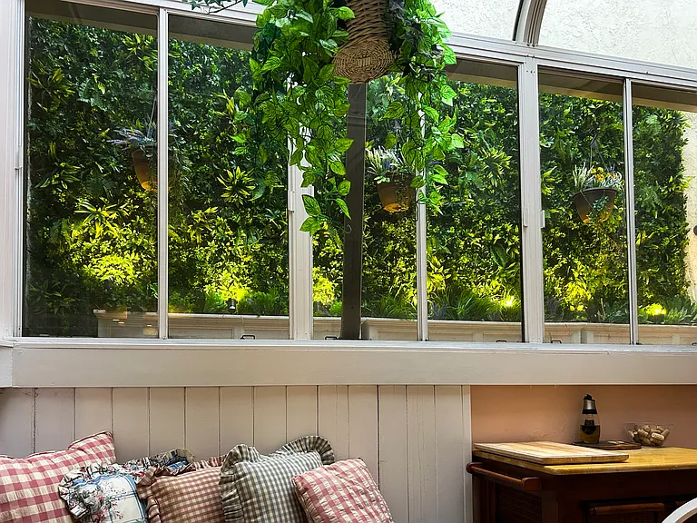 As seen here, the ivy lights up at dusk!