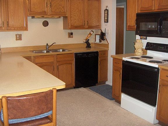 Eat In Kitchen Area With Counter Top Seating