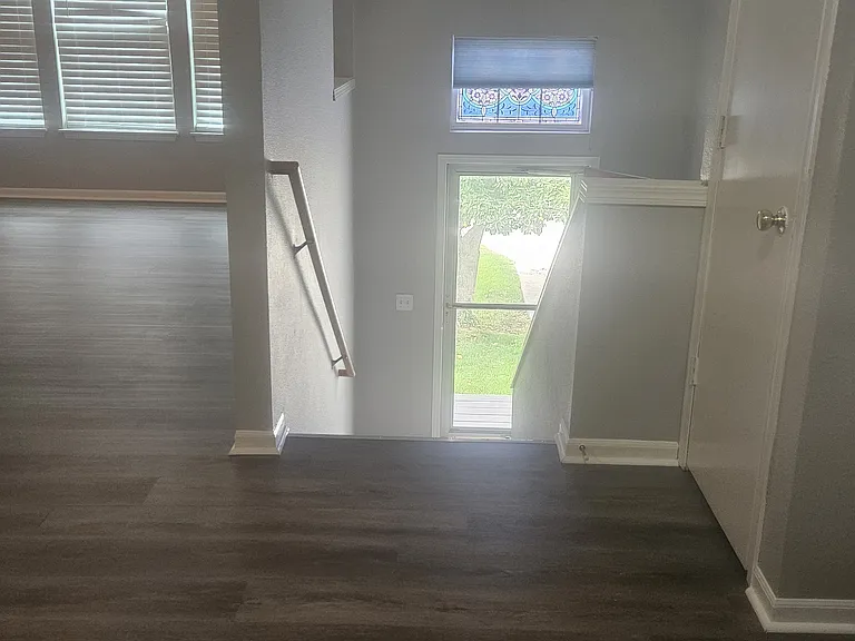 Dining, living area. Coat closet on the right