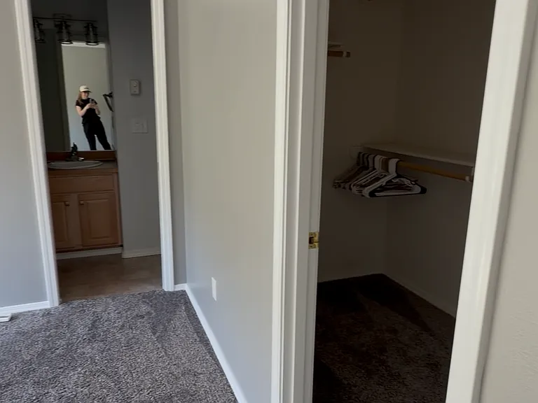 Master bedroom bathroom and walk-in closet