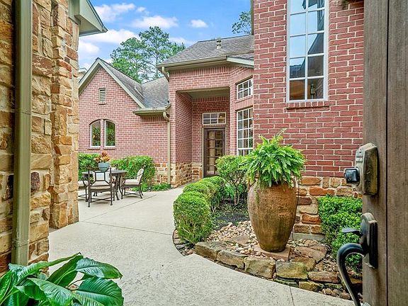 Step through the front door into this beautifully landscaped courtyard.