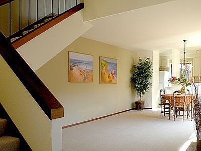 From entry to living/dining/kitchen and stairs to left bedroom