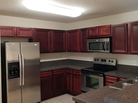 3rd image of 6965 Ortega Woods Dr Unit 6-9