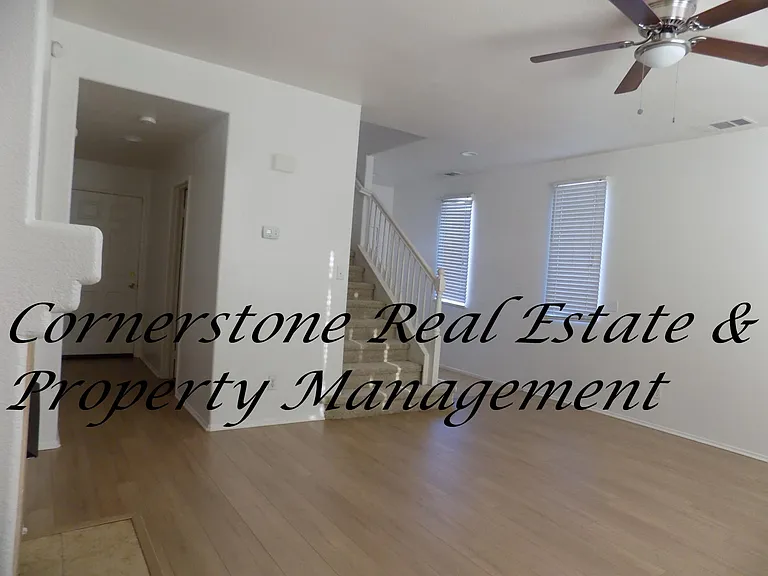 living room & hallway have new laminate flooring. Stairs have carpet.