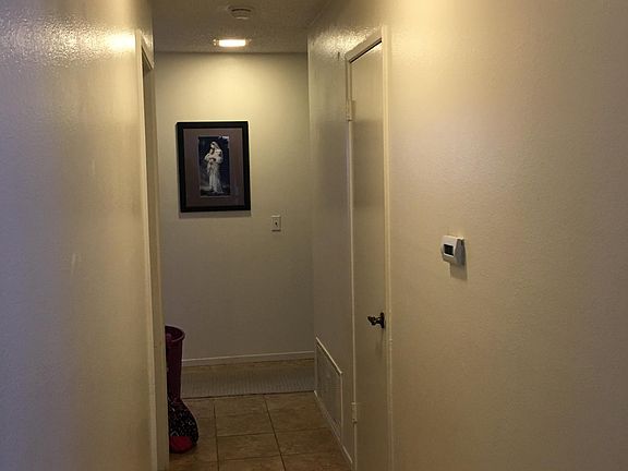 Hallway with storage closet