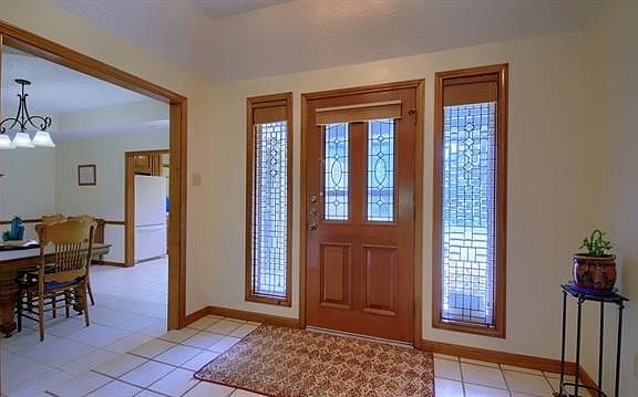 Double Transom door. Lots of hard tile. All welcoming one into the Great Room