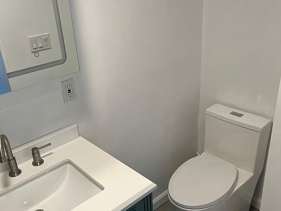 All new, tiled bathroom with the latest gadgets (heated/lighted mirror, bidet seat, exhaust fan)
