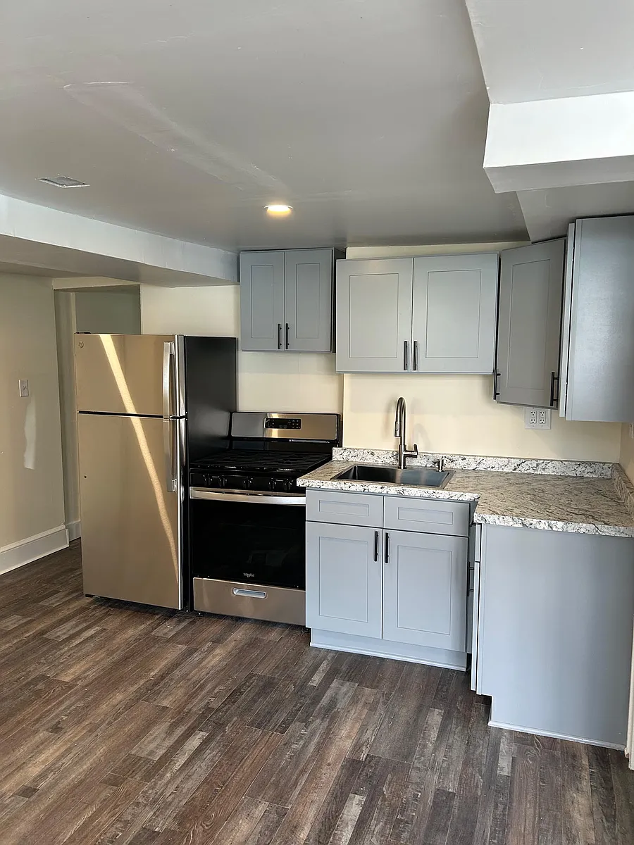 Newly renovated kitchen featuring brand new cabinets, countertop, and stainless steel appliances - 505 Washington St #505B