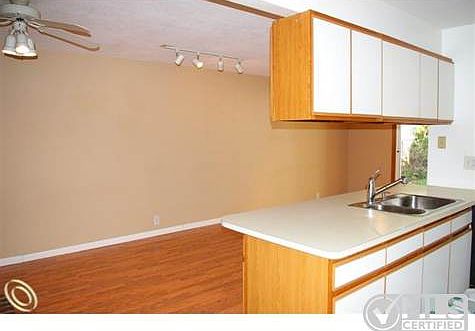 Kitchen into Family Roomy Room