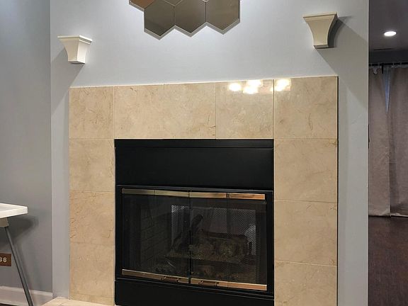 See through fireplace separates living and dining area!