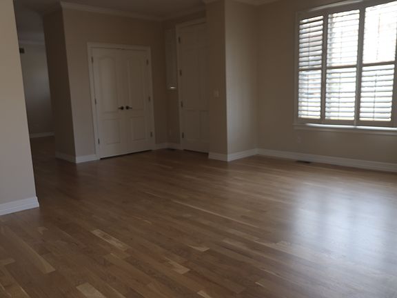 Front Living room with side door access, all new white oak flooring