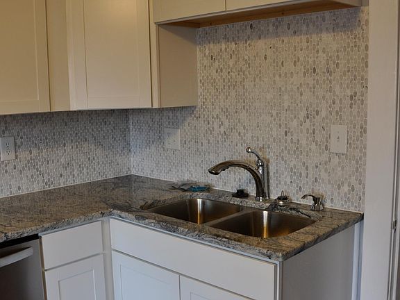 Kitchen sink with garbage disposal.
