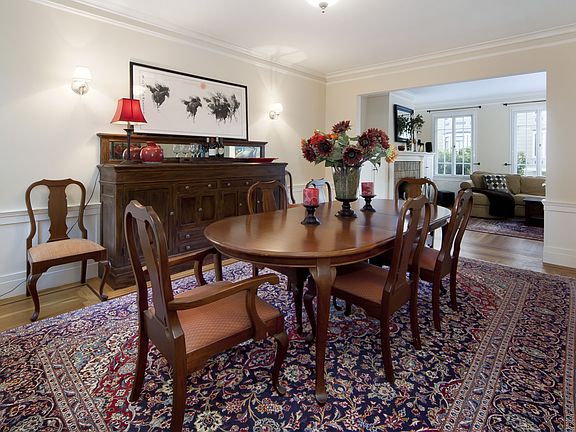 Dining room with built-in hutch facing west